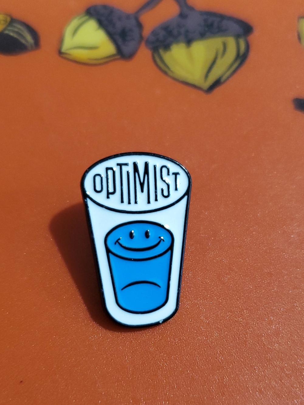 Optimist Smiley Glass Enamel Pin